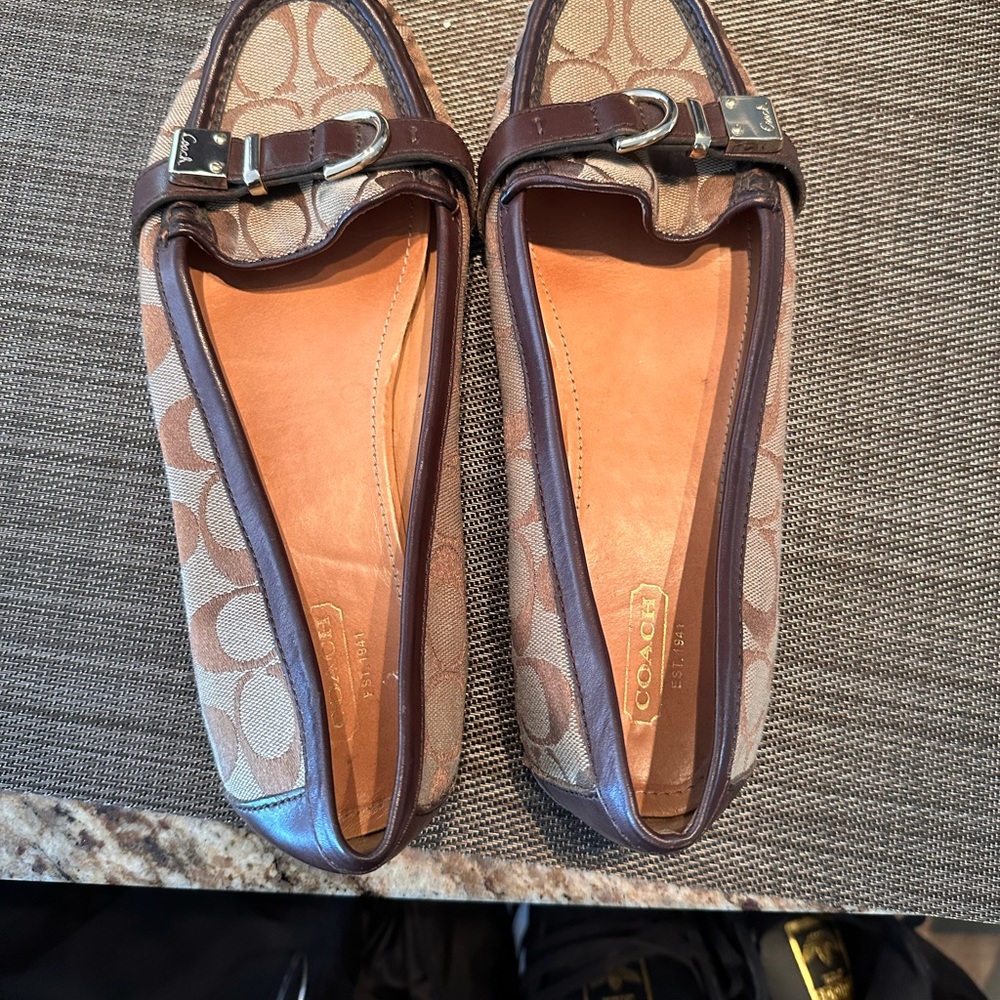 Women’s size 9 1/2 Coach Shoes barely worn.